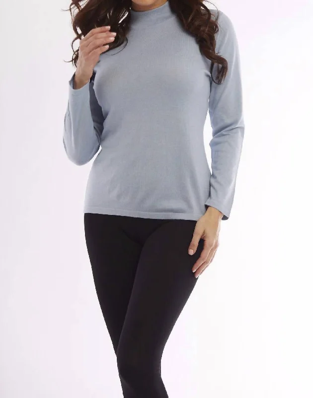 Get It Before It’s Gone Long Sleeve Mock Neck Top In Skyblue