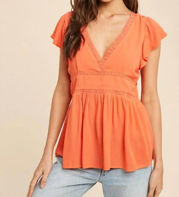 Limited Quantity Holly Flutter Sleeve Tie-Back Top In Coral